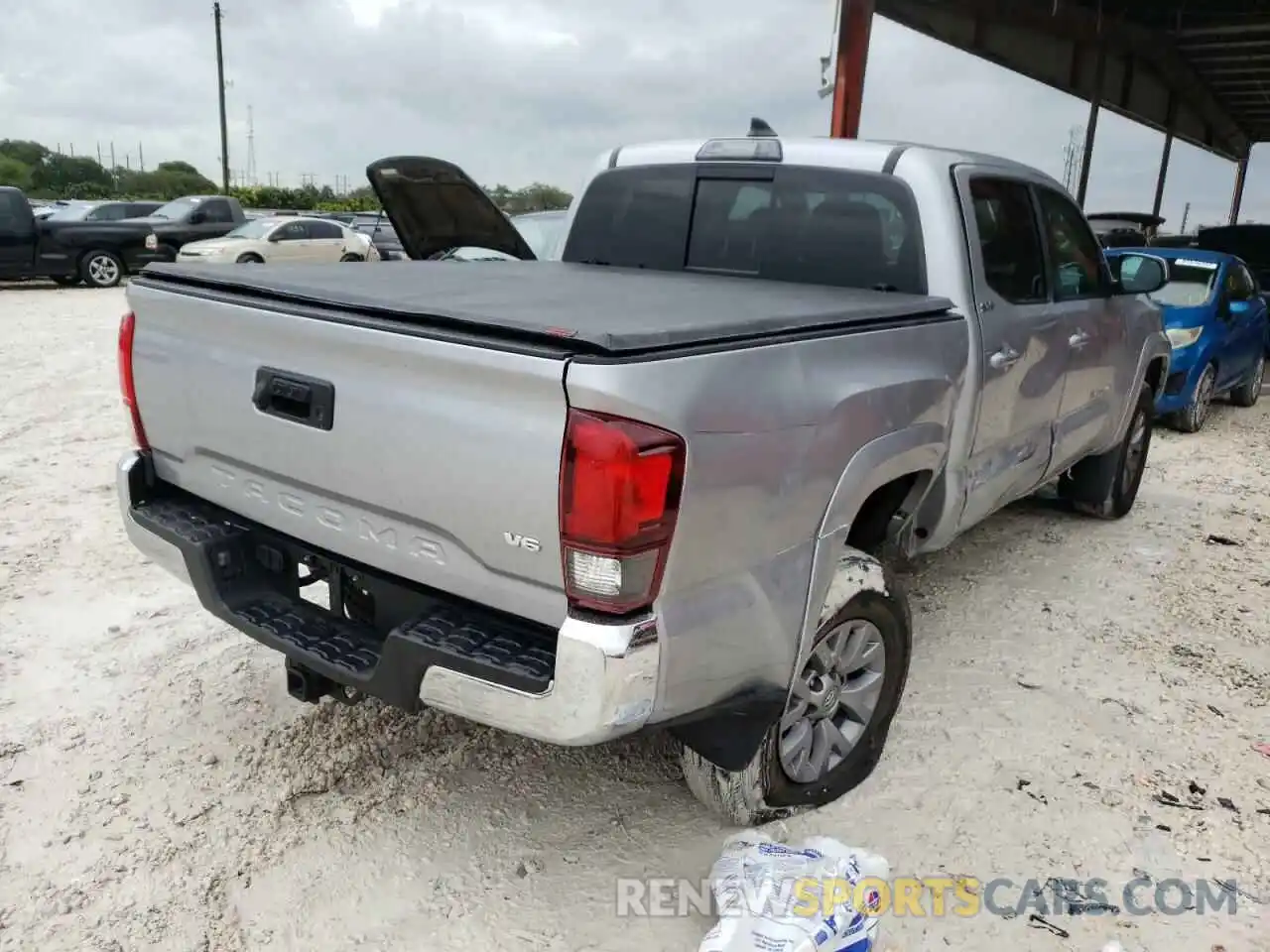 4 Photograph of a damaged car 3TMAZ5CNXKM110472 TOYOTA TACOMA 2019