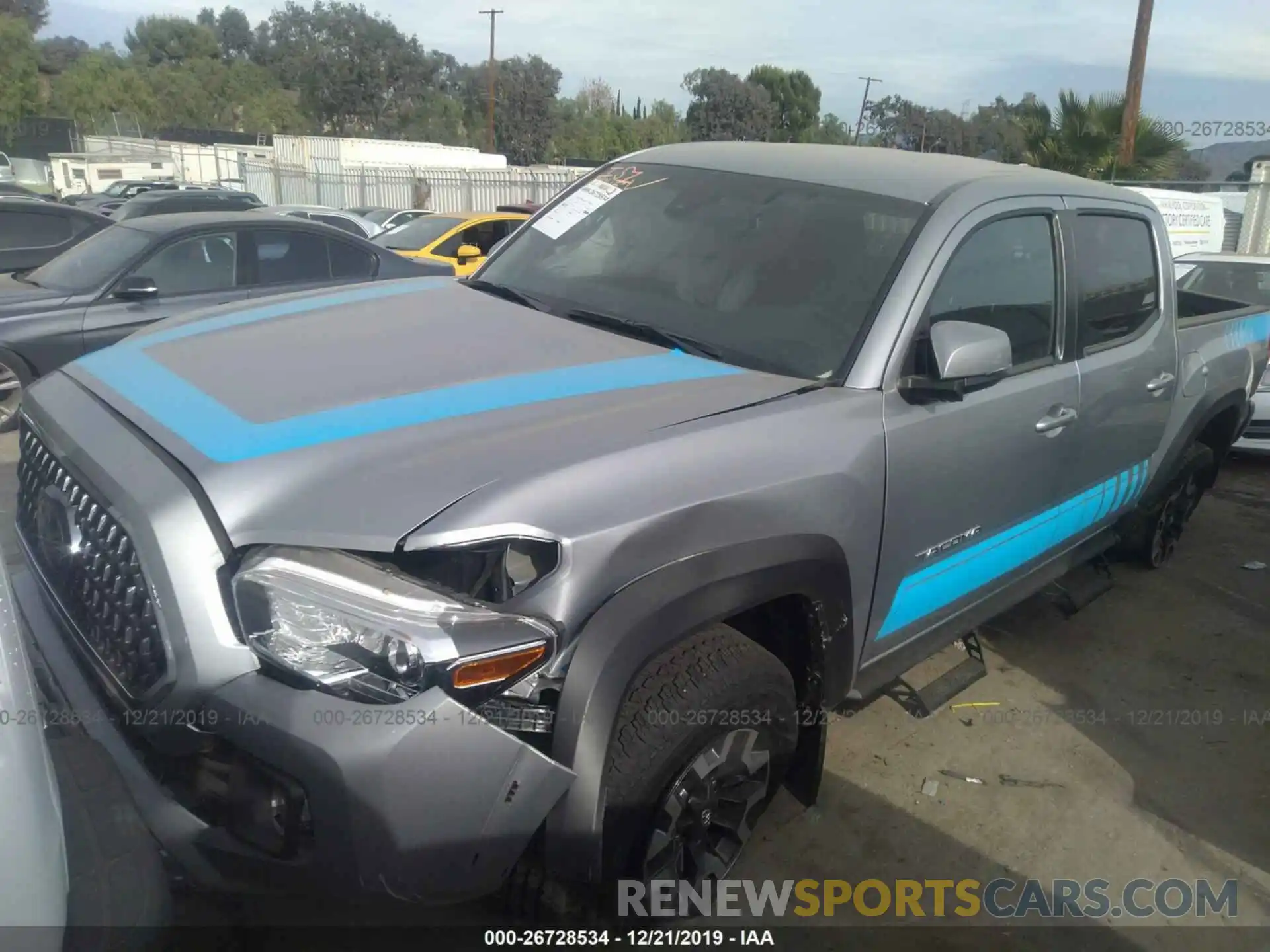 2 Photograph of a damaged car 3TMAZ5CNXKM110682 TOYOTA TACOMA 2019