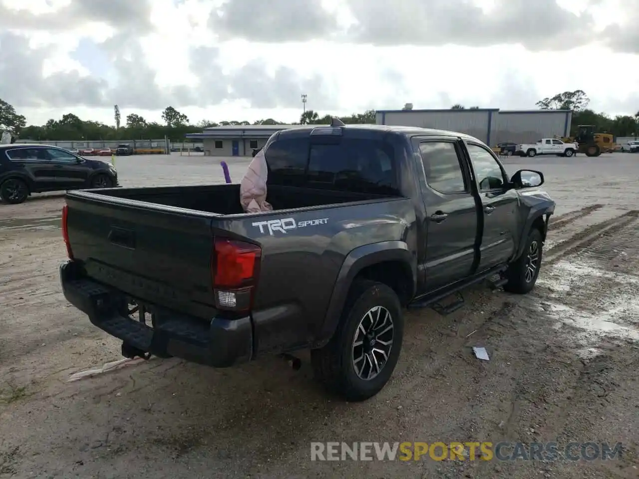 4 Photograph of a damaged car 3TMAZ5CNXKM110813 TOYOTA TACOMA 2019