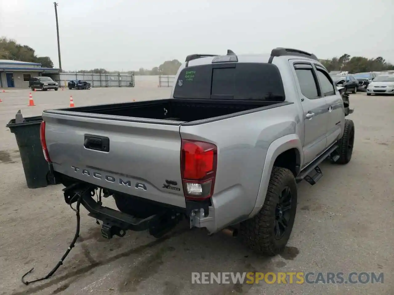 4 Photograph of a damaged car 3TMAZ5CNXKM111749 TOYOTA TACOMA 2019