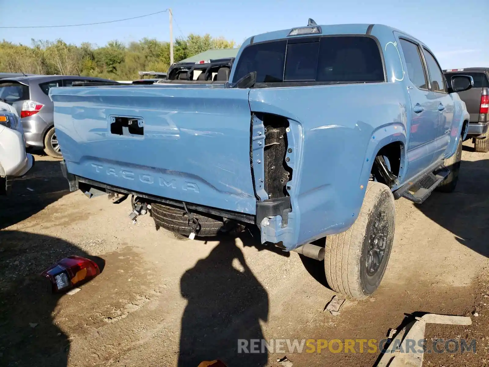 4 Photograph of a damaged car 3TMAZ5CNXKM112156 TOYOTA TACOMA 2019