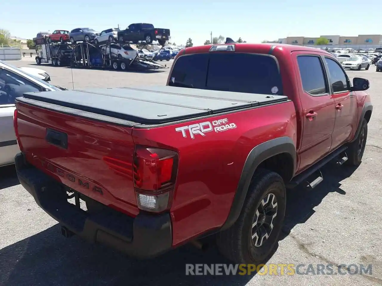 4 Photograph of a damaged car 3TMAZ5CNXKM113310 TOYOTA TACOMA 2019