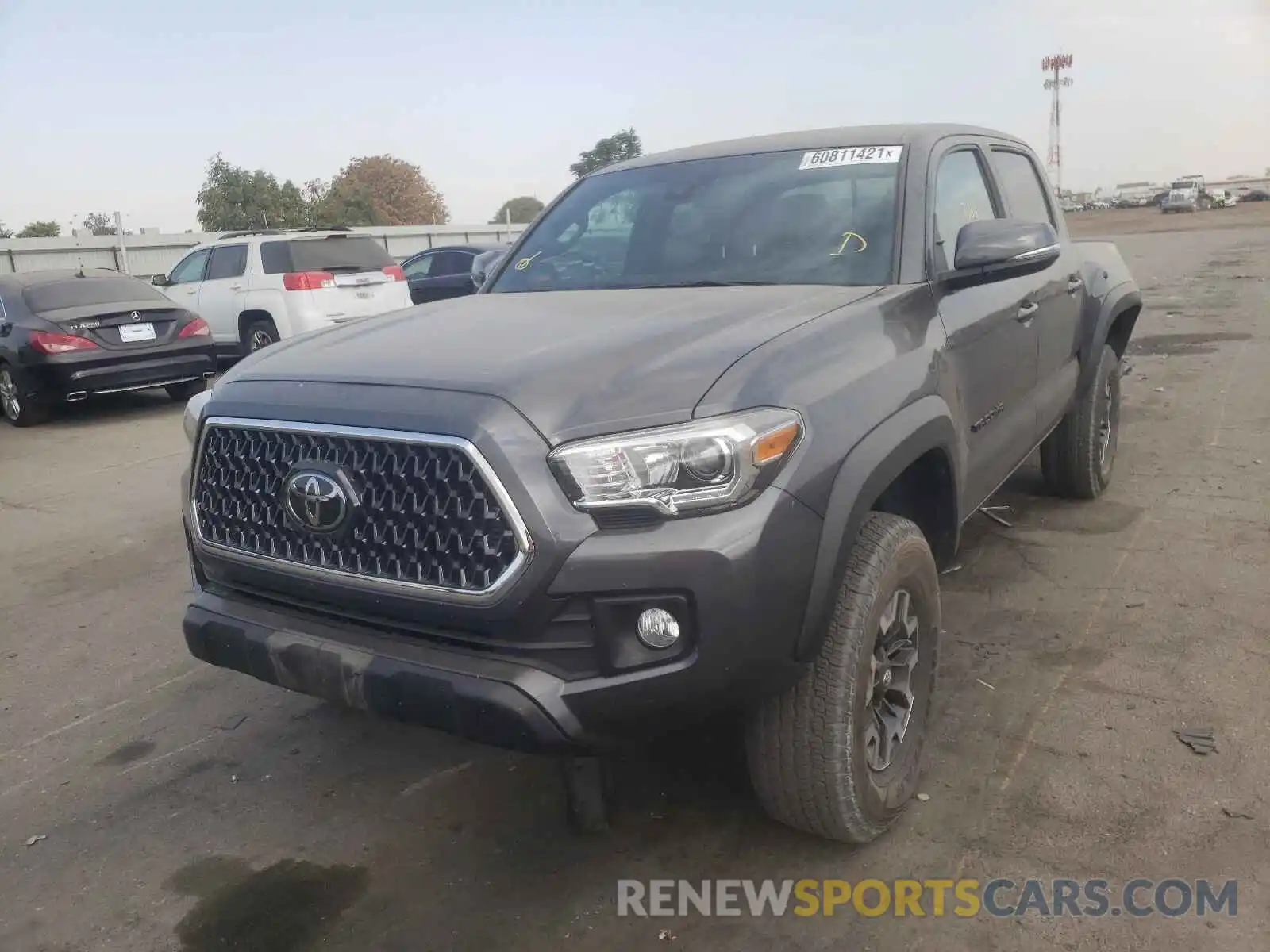 2 Photograph of a damaged car 3TMAZ5CNXKM113887 TOYOTA TACOMA 2019