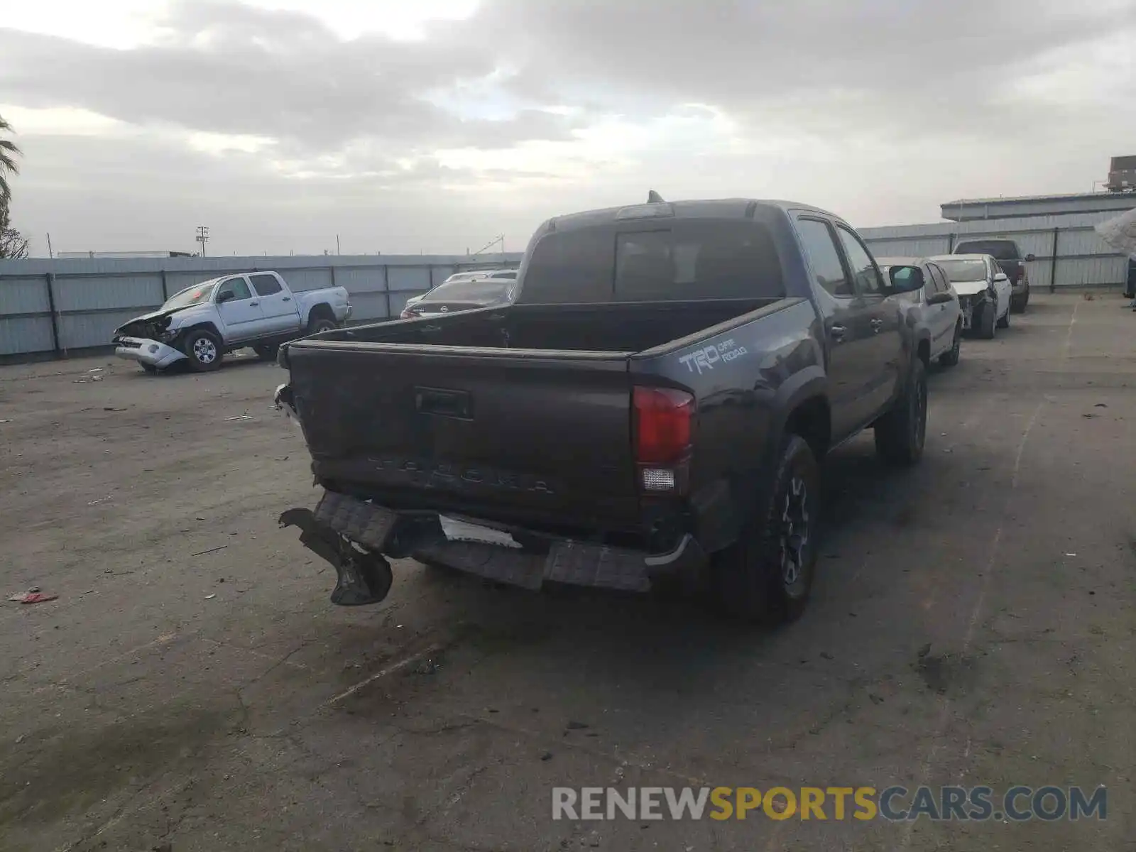 4 Photograph of a damaged car 3TMAZ5CNXKM113887 TOYOTA TACOMA 2019