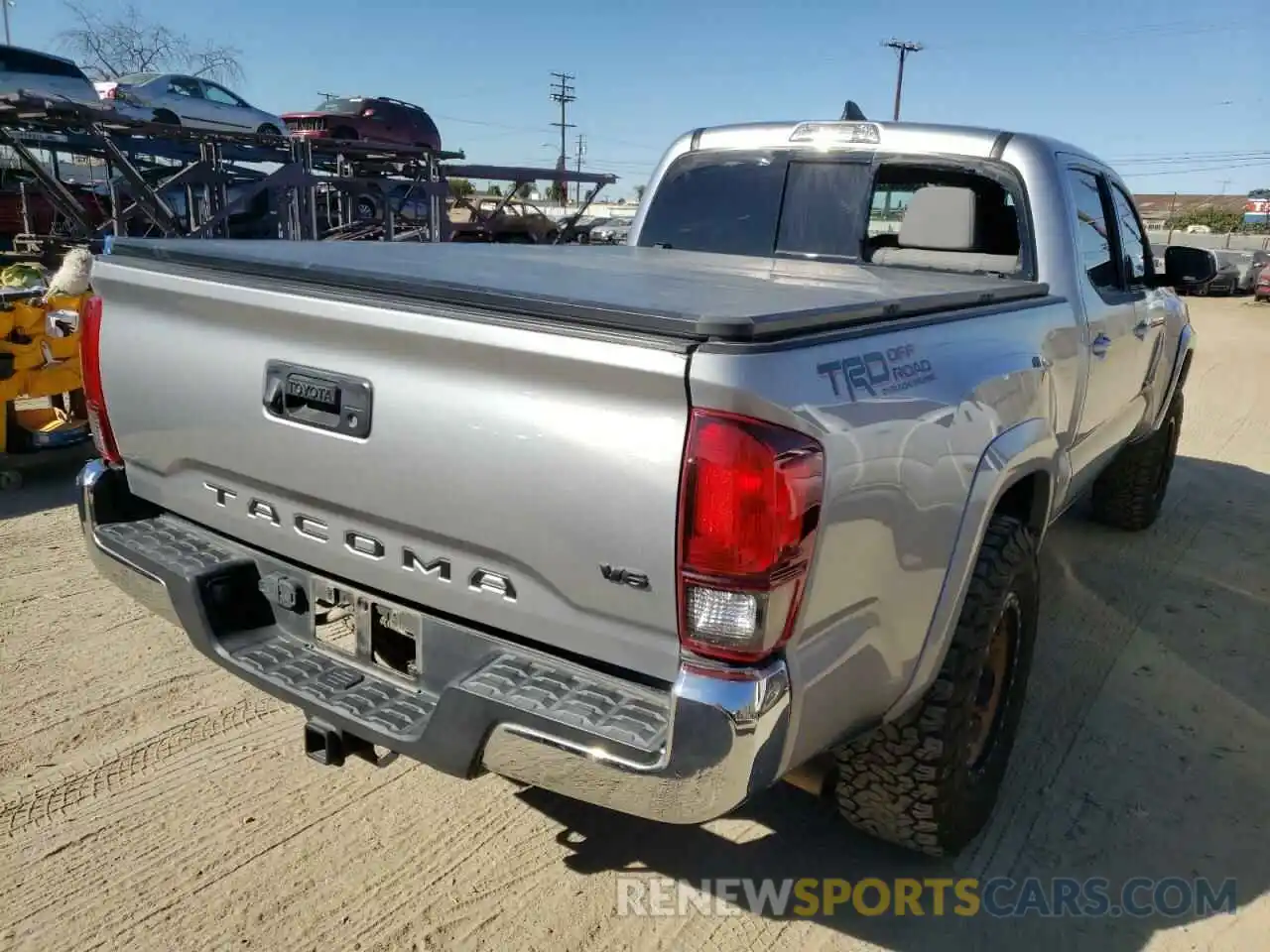 4 Photograph of a damaged car 3TMBZ5DN2KM020221 TOYOTA TACOMA 2019