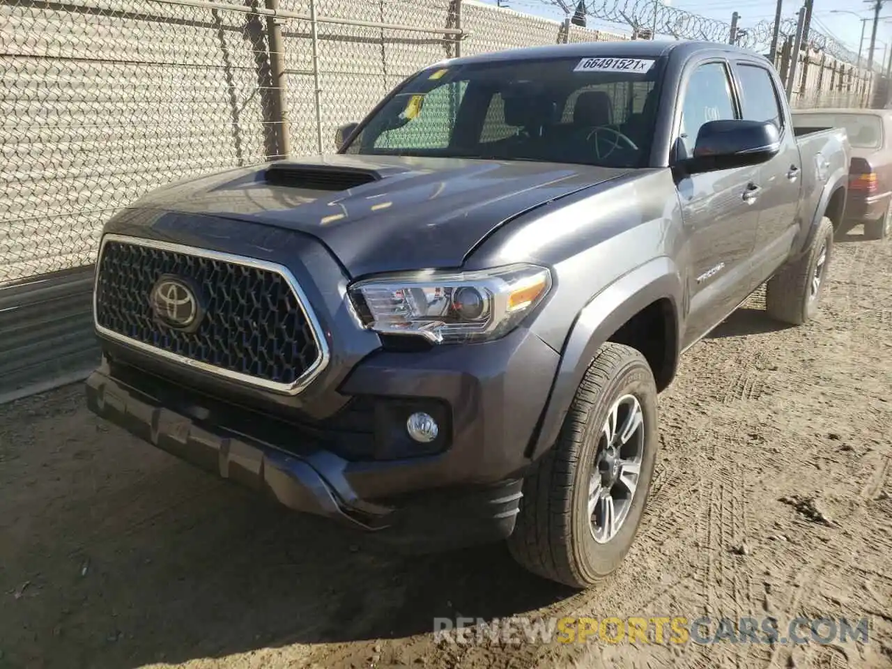 2 Photograph of a damaged car 3TMBZ5DN2KM022132 TOYOTA TACOMA 2019