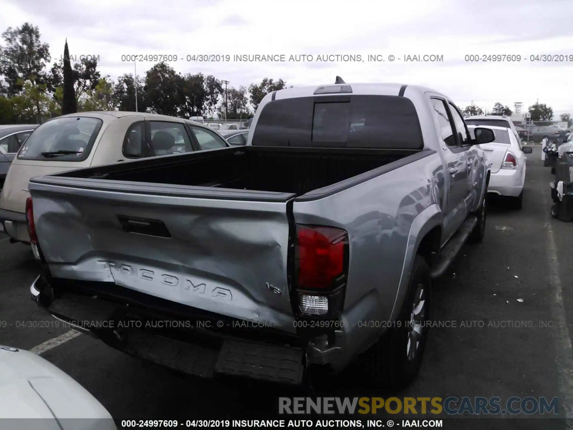 4 Photograph of a damaged car 3TMBZ5DN3KM018395 TOYOTA TACOMA 2019