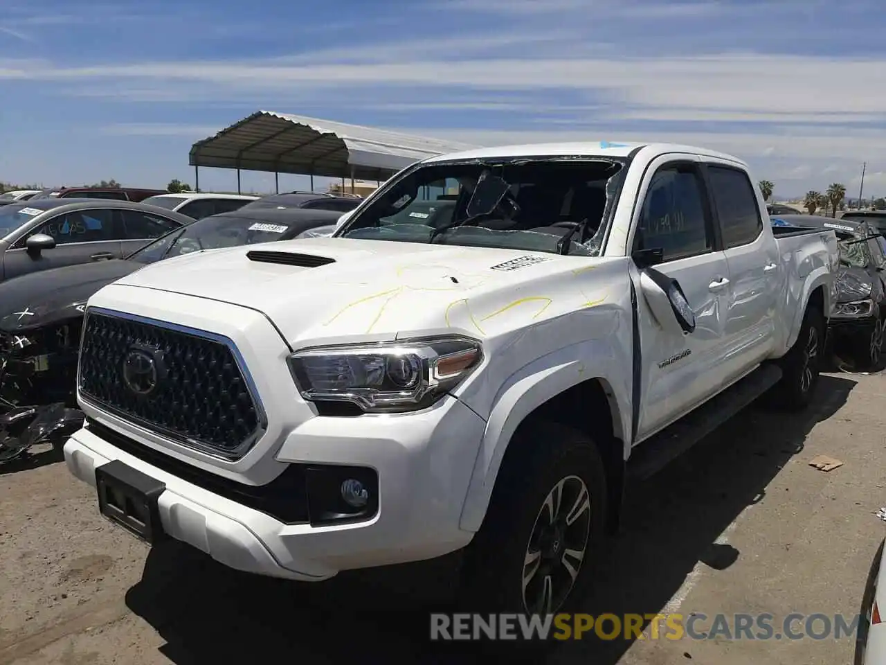 2 Photograph of a damaged car 3TMBZ5DN3KM019319 TOYOTA TACOMA 2019