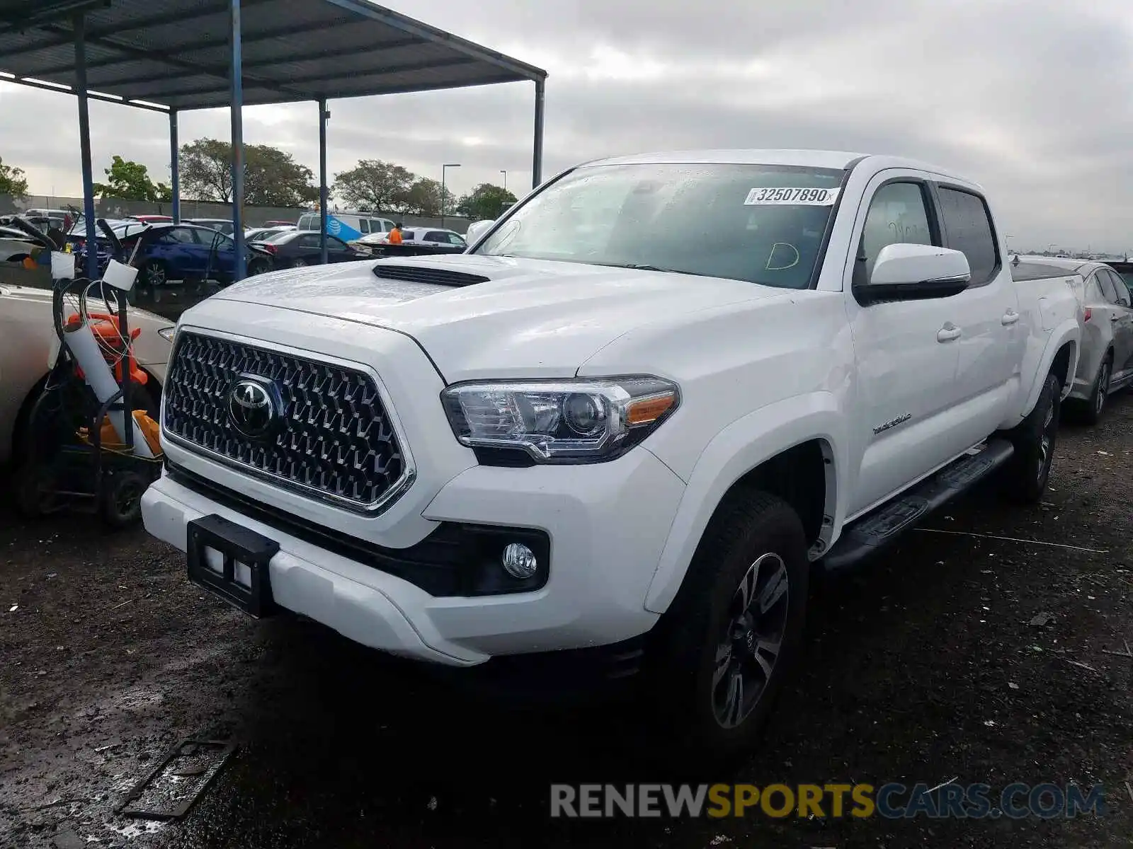 2 Photograph of a damaged car 3TMBZ5DN3KM019742 TOYOTA TACOMA 2019