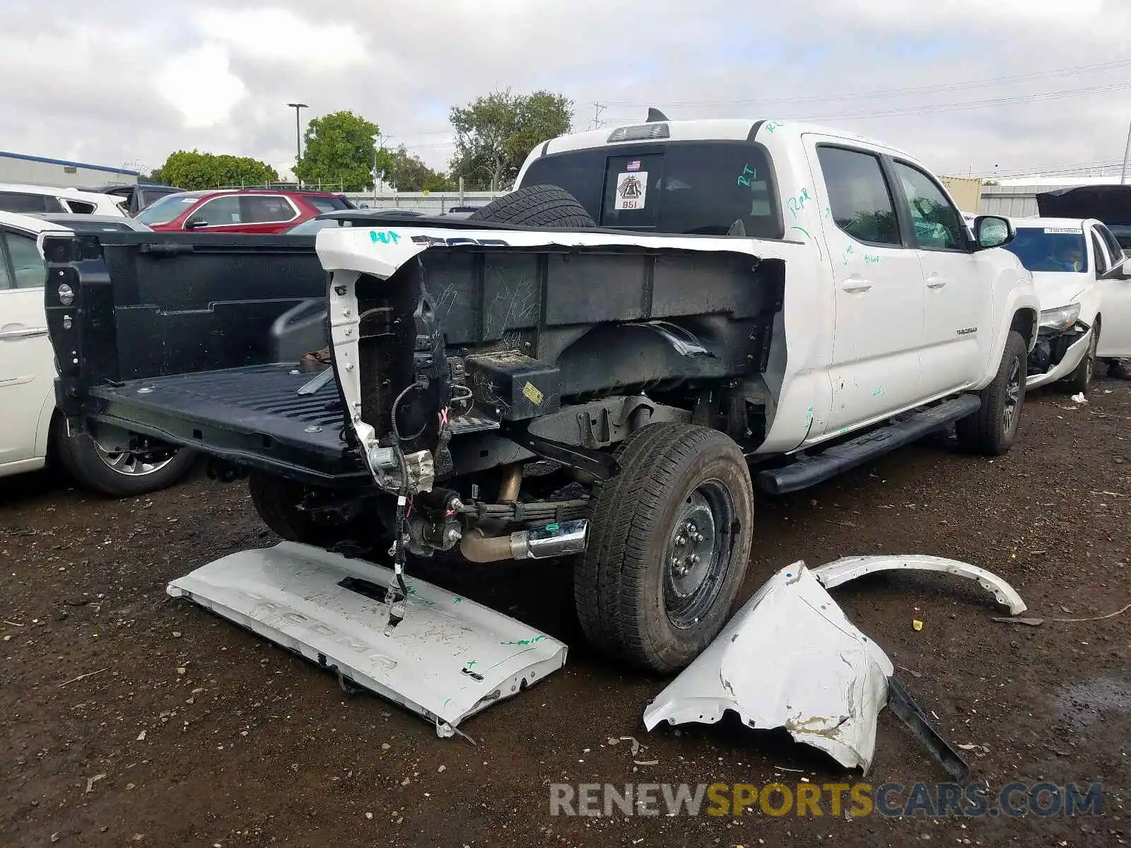 4 Photograph of a damaged car 3TMBZ5DN3KM019742 TOYOTA TACOMA 2019