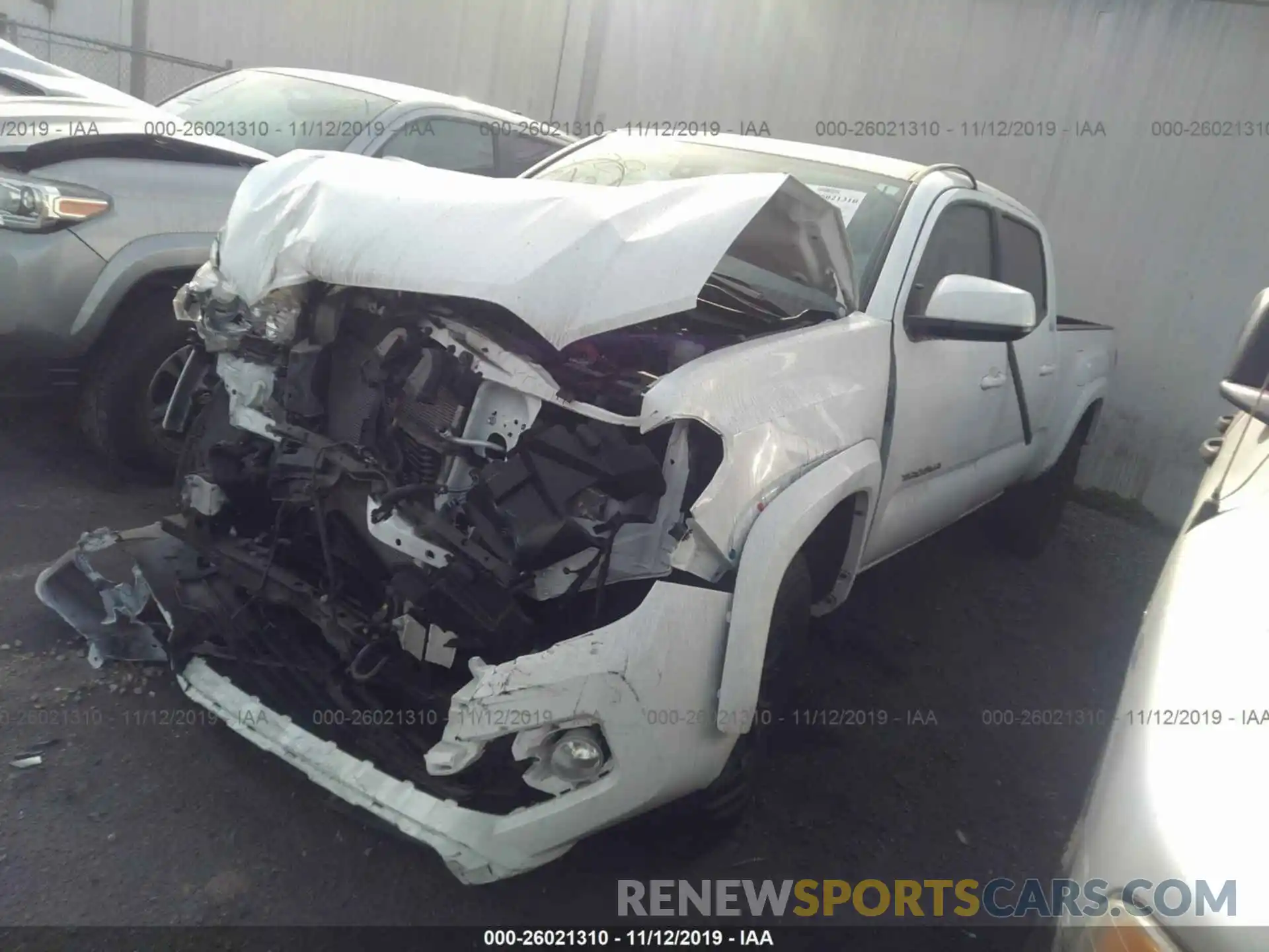 2 Photograph of a damaged car 3TMBZ5DN3KM020650 TOYOTA TACOMA 2019