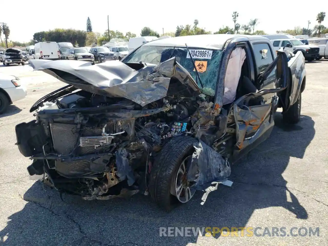 2 Photograph of a damaged car 3TMBZ5DN3KM022463 TOYOTA TACOMA 2019