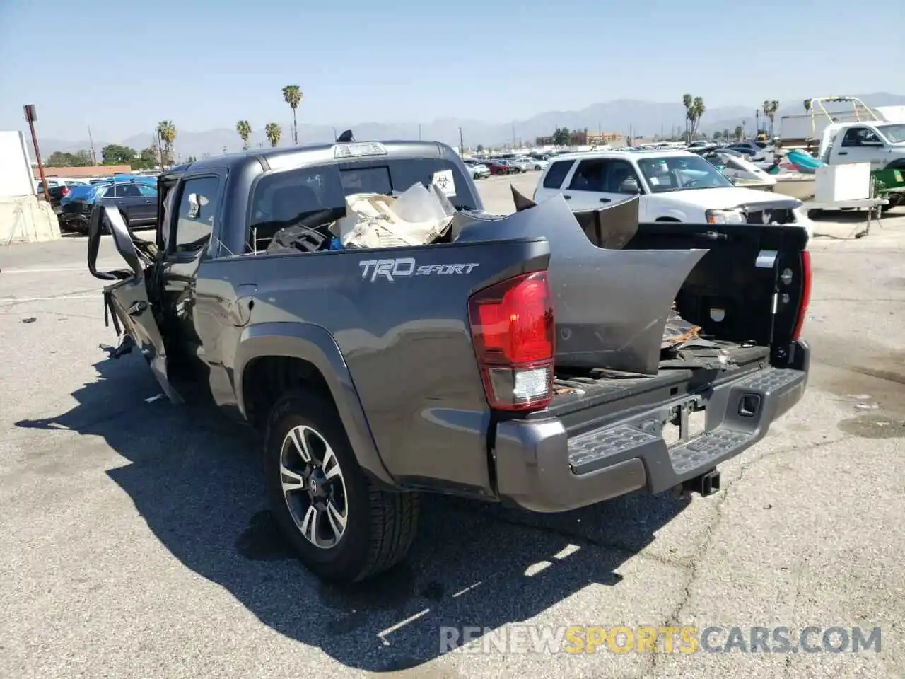 3 Photograph of a damaged car 3TMBZ5DN3KM022463 TOYOTA TACOMA 2019