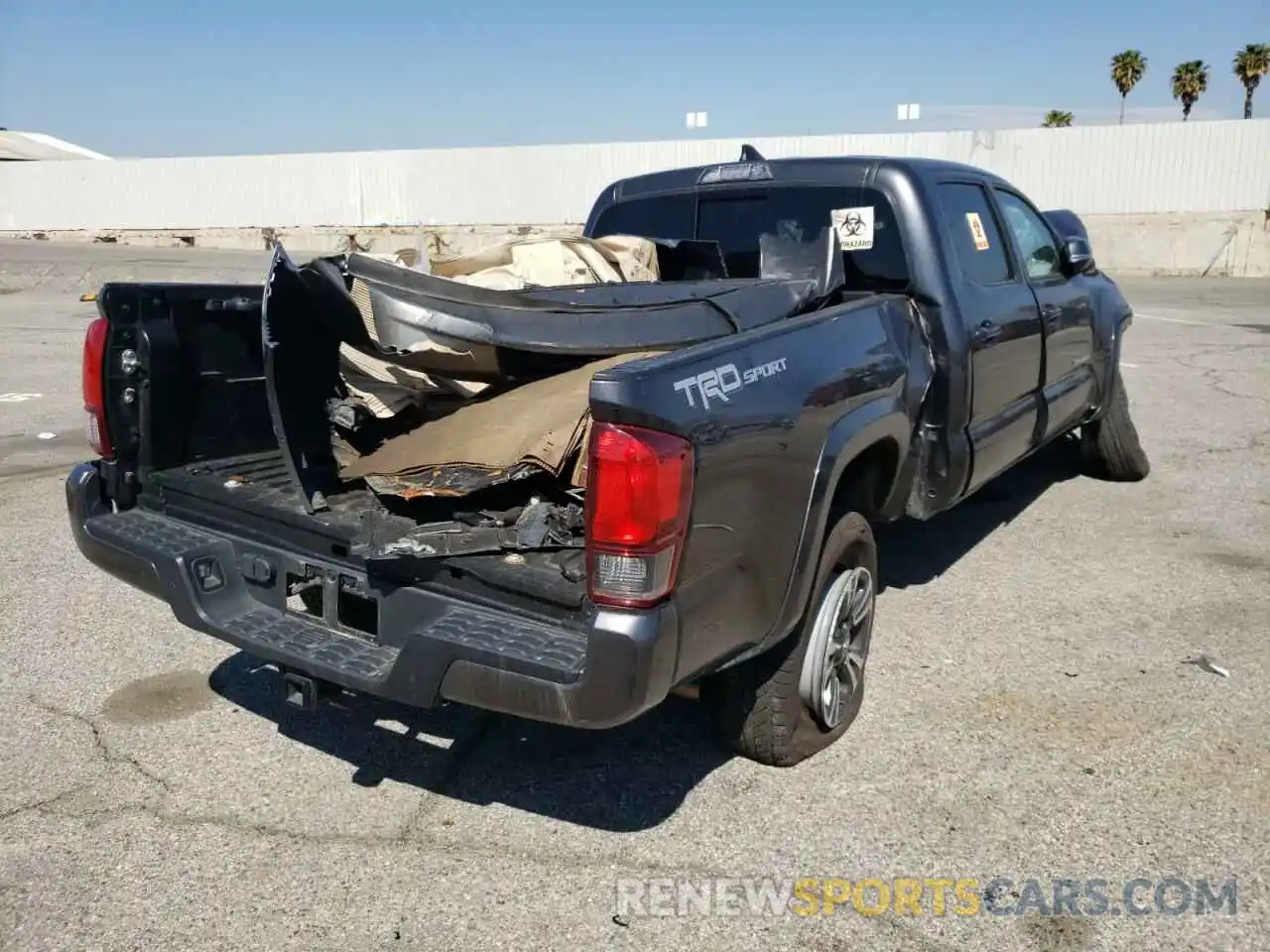 4 Photograph of a damaged car 3TMBZ5DN3KM022463 TOYOTA TACOMA 2019