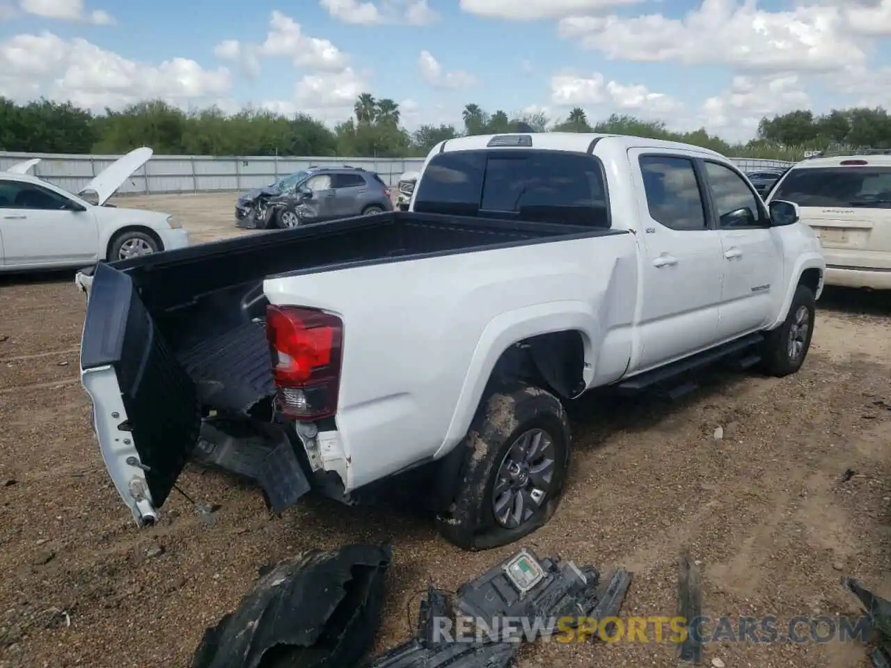 4 Photograph of a damaged car 3TMBZ5DN4KM017580 TOYOTA TACOMA 2019