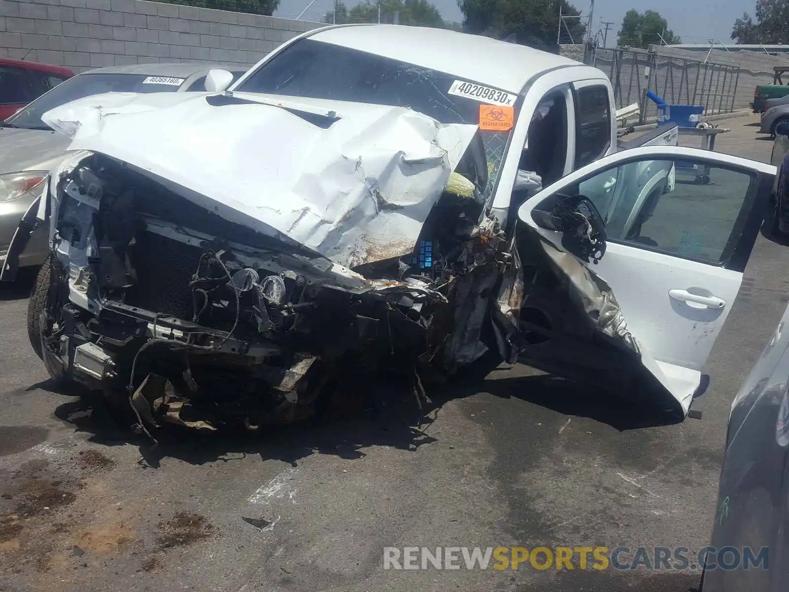 2 Photograph of a damaged car 3TMBZ5DN4KM018521 TOYOTA TACOMA 2019