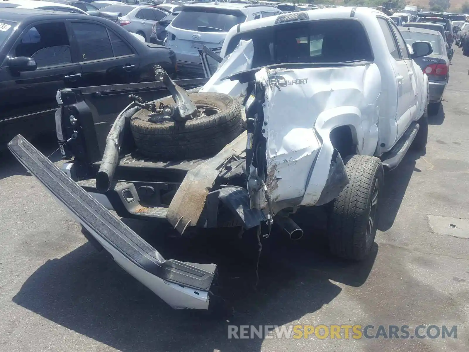 4 Photograph of a damaged car 3TMBZ5DN4KM018521 TOYOTA TACOMA 2019