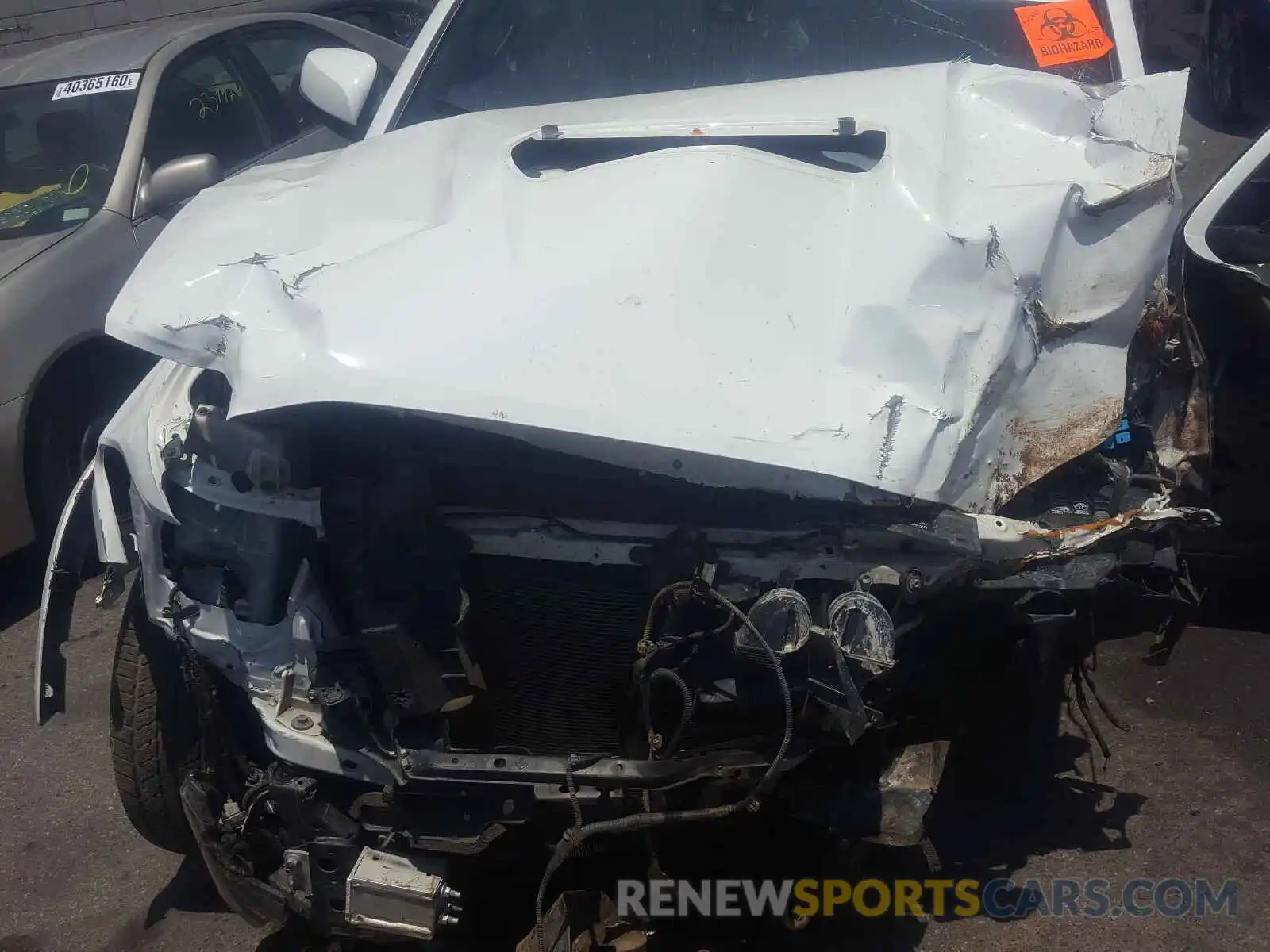 7 Photograph of a damaged car 3TMBZ5DN4KM018521 TOYOTA TACOMA 2019