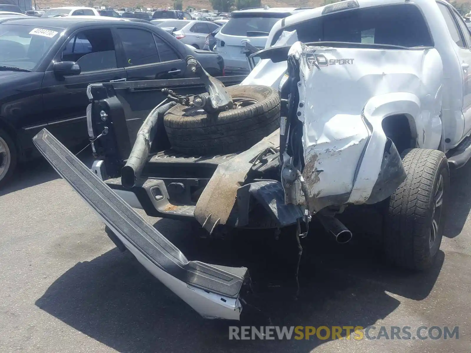 9 Photograph of a damaged car 3TMBZ5DN4KM018521 TOYOTA TACOMA 2019