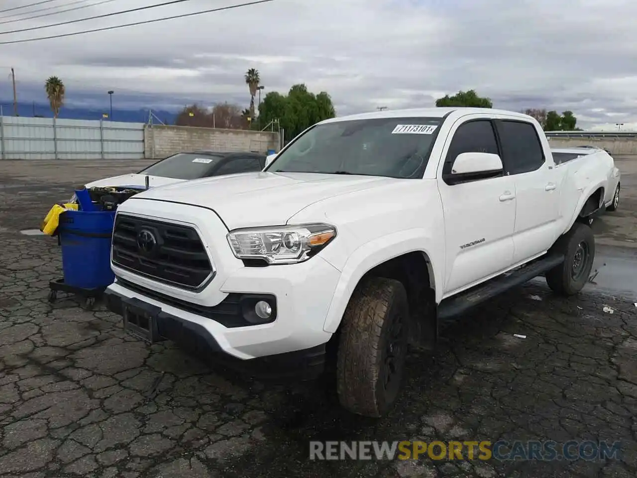 2 Photograph of a damaged car 3TMBZ5DN4KM019474 TOYOTA TACOMA 2019