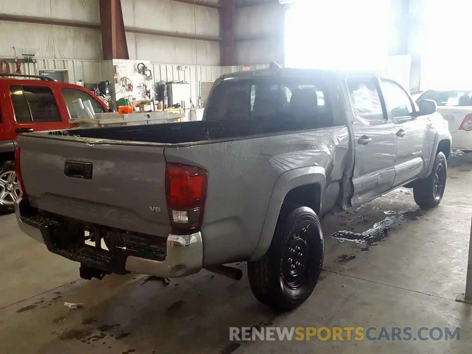 4 Photograph of a damaged car 3TMBZ5DN4KM020642 TOYOTA TACOMA 2019