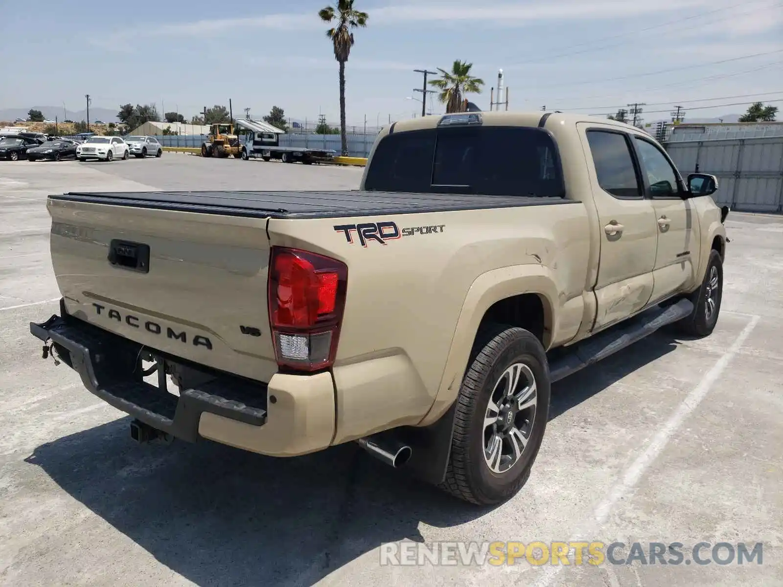 4 Photograph of a damaged car 3TMBZ5DN4KM021080 TOYOTA TACOMA 2019