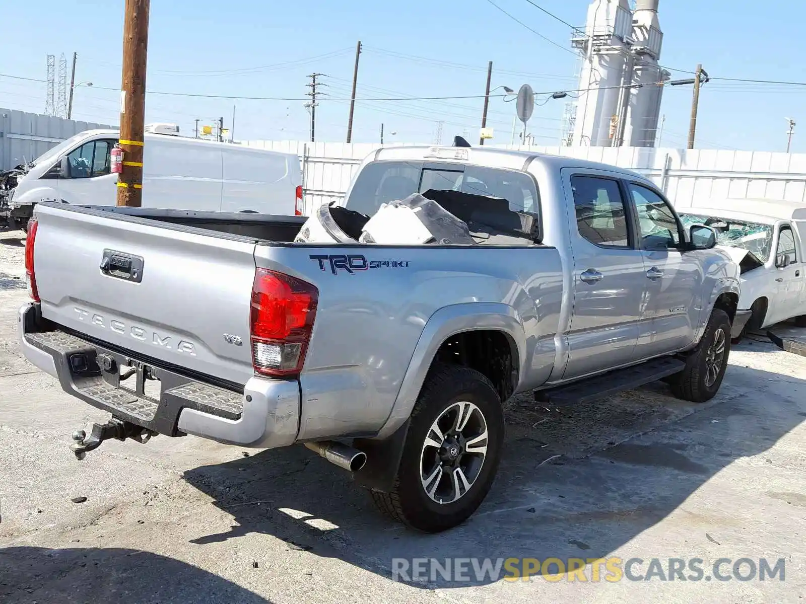 4 Photograph of a damaged car 3TMBZ5DN4KM022195 TOYOTA TACOMA 2019