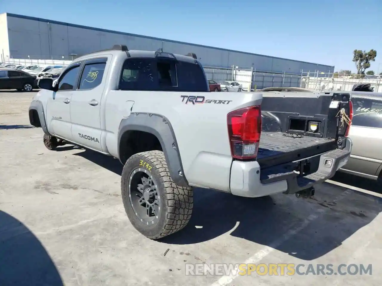 3 Photograph of a damaged car 3TMBZ5DN5KM018561 TOYOTA TACOMA 2019