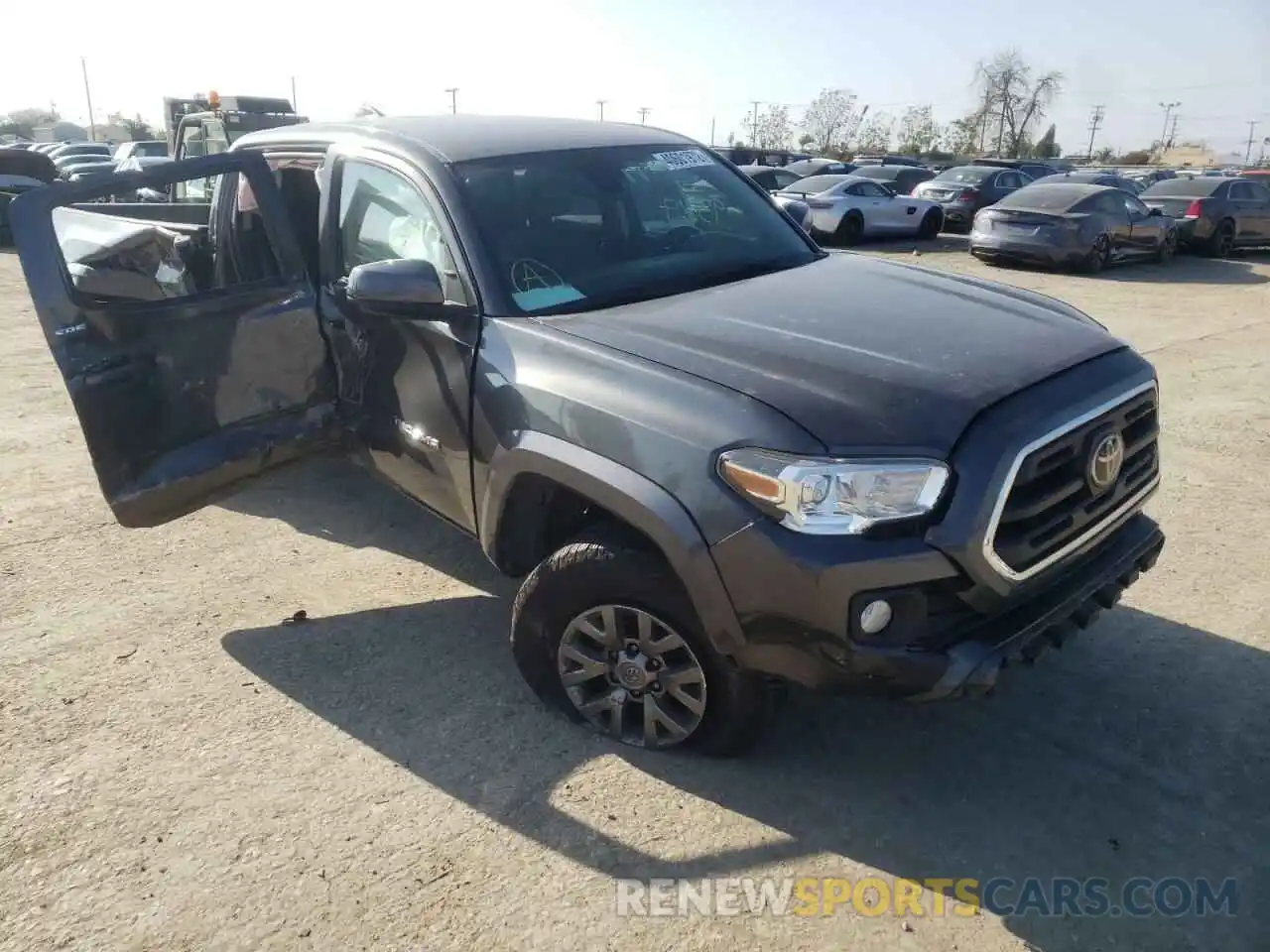 1 Photograph of a damaged car 3TMBZ5DN5KM018849 TOYOTA TACOMA 2019