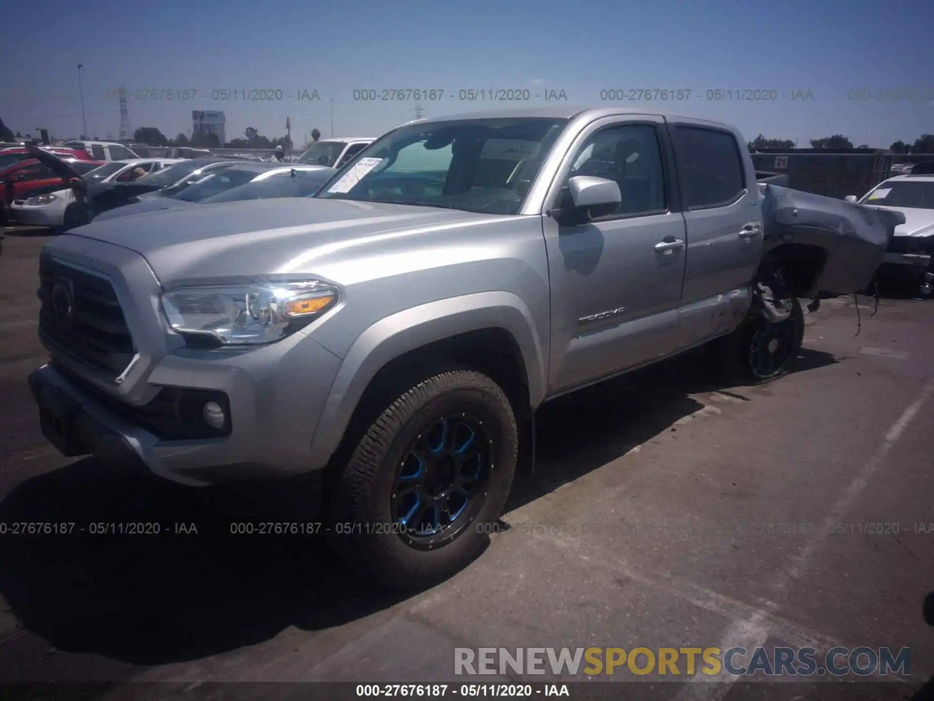 2 Photograph of a damaged car 3TMBZ5DN5KM018852 TOYOTA TACOMA 2019