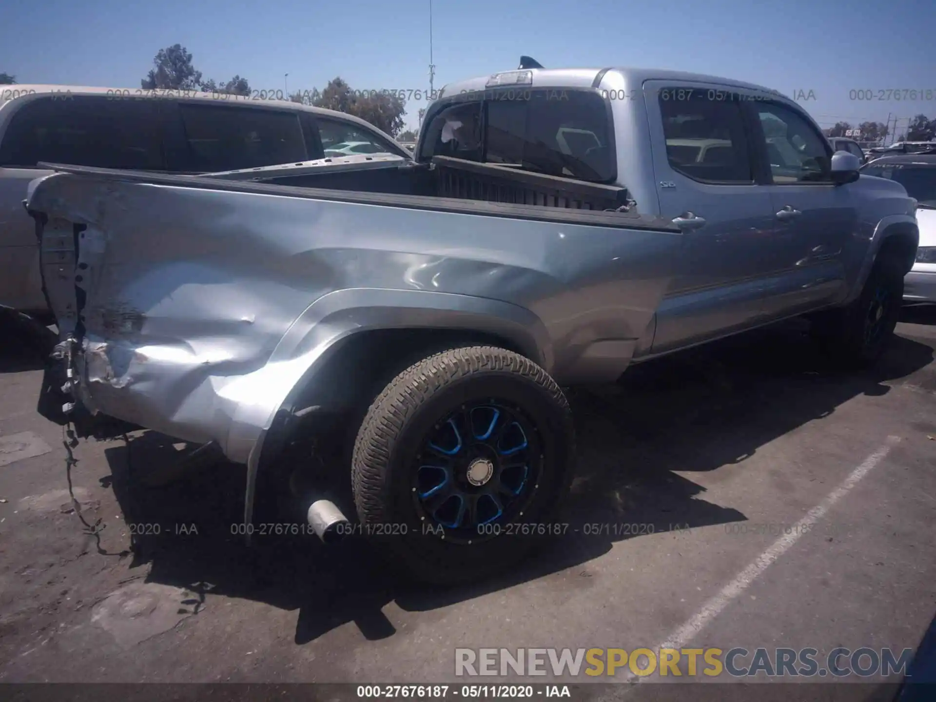 4 Photograph of a damaged car 3TMBZ5DN5KM018852 TOYOTA TACOMA 2019