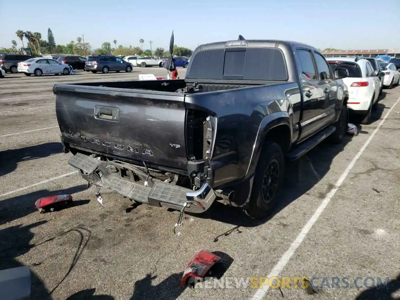 4 Photograph of a damaged car 3TMBZ5DN5KM019094 TOYOTA TACOMA 2019