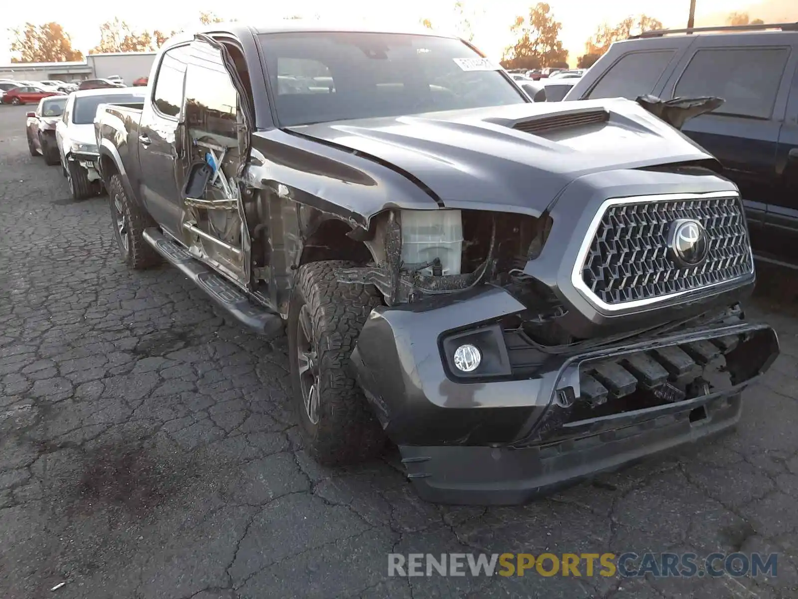 1 Photograph of a damaged car 3TMBZ5DN5KM019371 TOYOTA TACOMA 2019