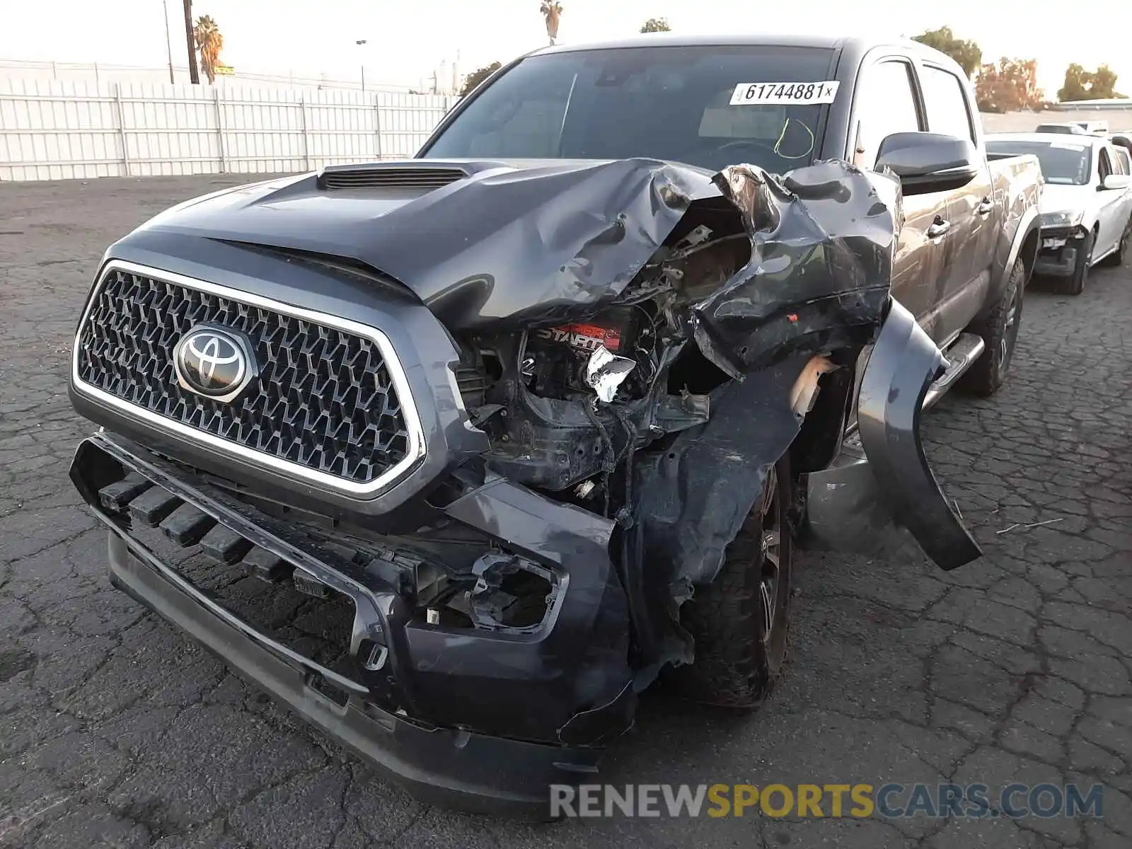 2 Photograph of a damaged car 3TMBZ5DN5KM019371 TOYOTA TACOMA 2019