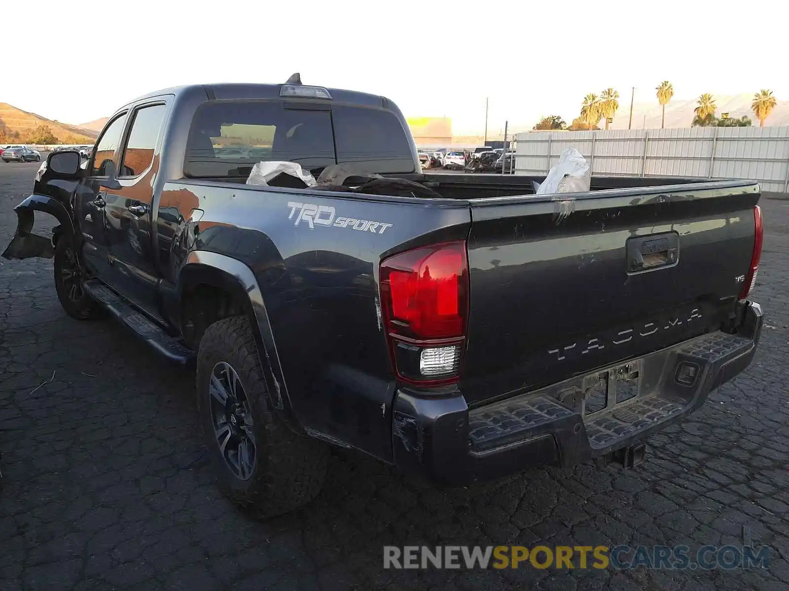 3 Photograph of a damaged car 3TMBZ5DN5KM019371 TOYOTA TACOMA 2019