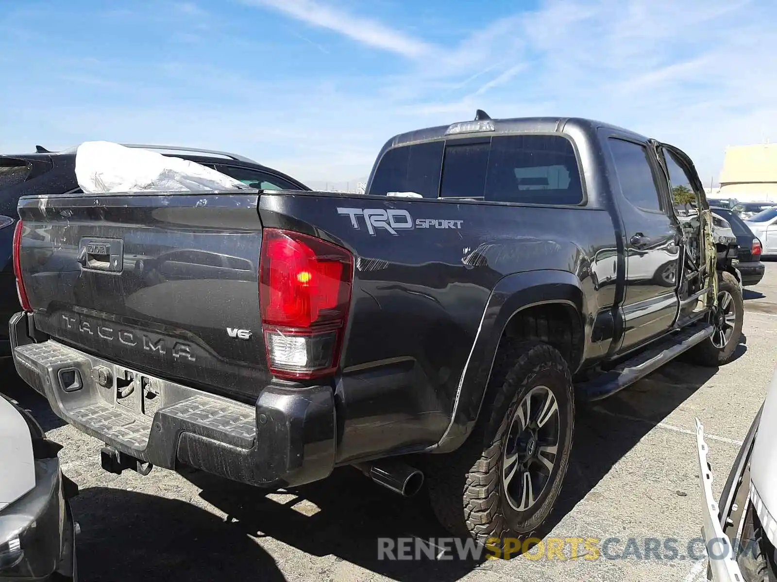 4 Photograph of a damaged car 3TMBZ5DN5KM019371 TOYOTA TACOMA 2019