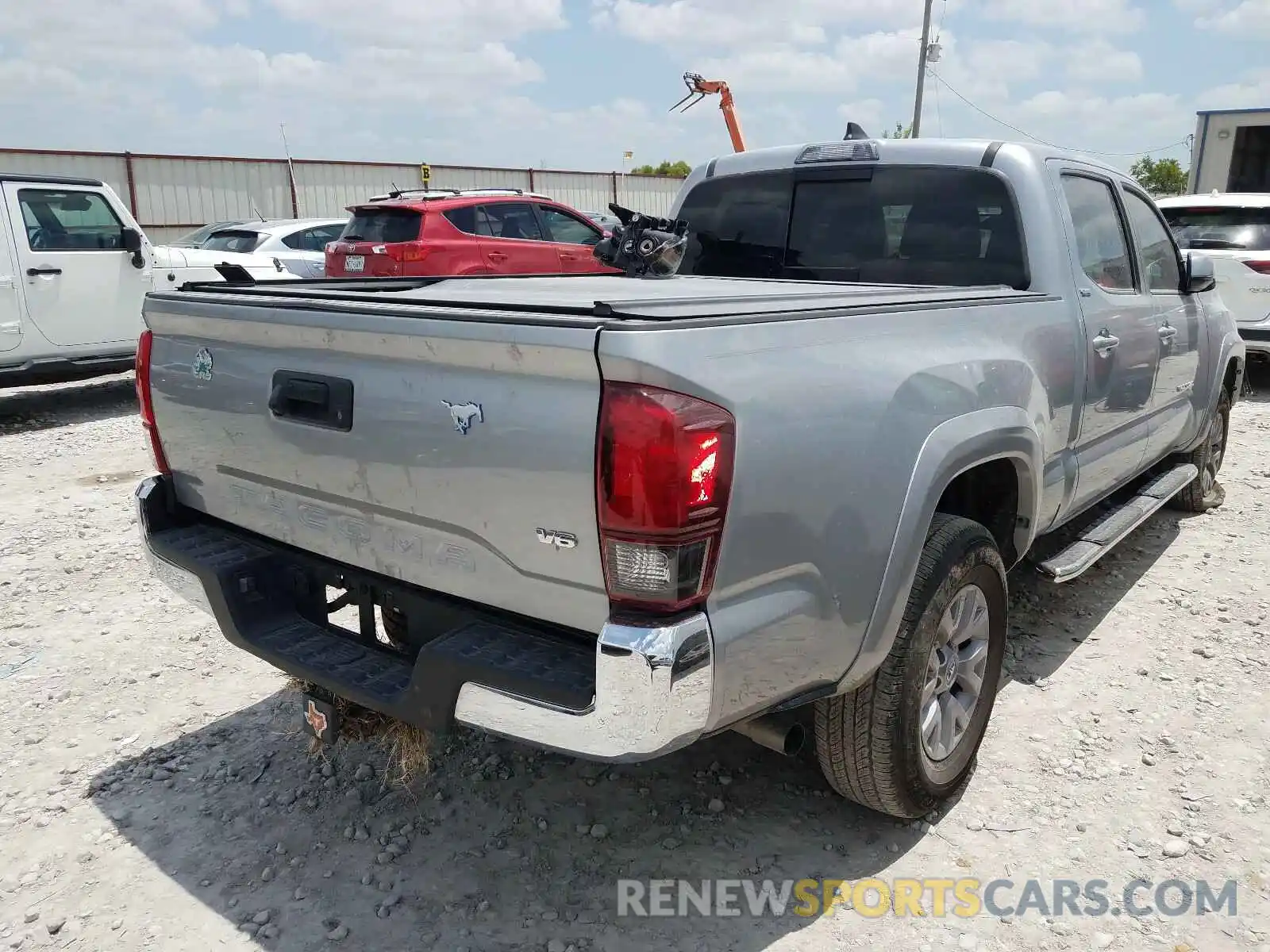 4 Photograph of a damaged car 3TMBZ5DN5KM021475 TOYOTA TACOMA 2019