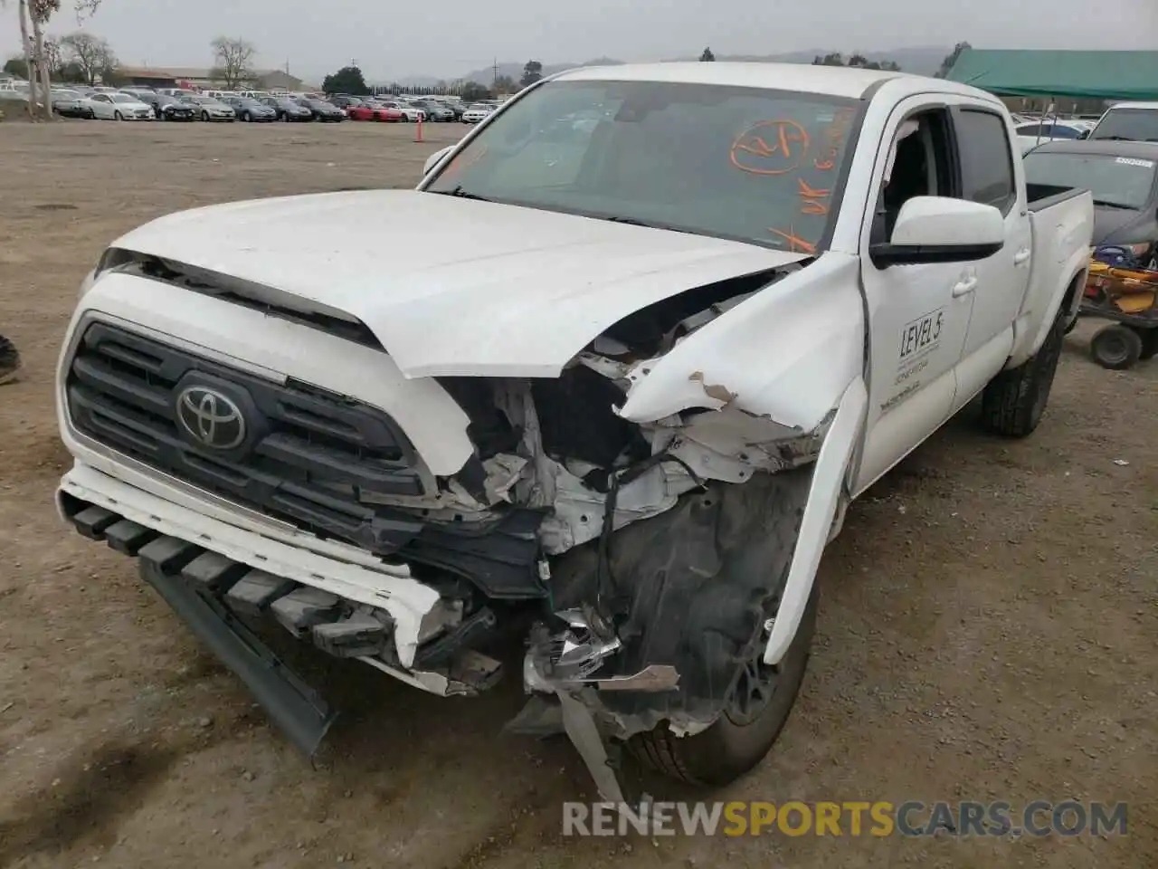 2 Photograph of a damaged car 3TMBZ5DN5KM021914 TOYOTA TACOMA 2019