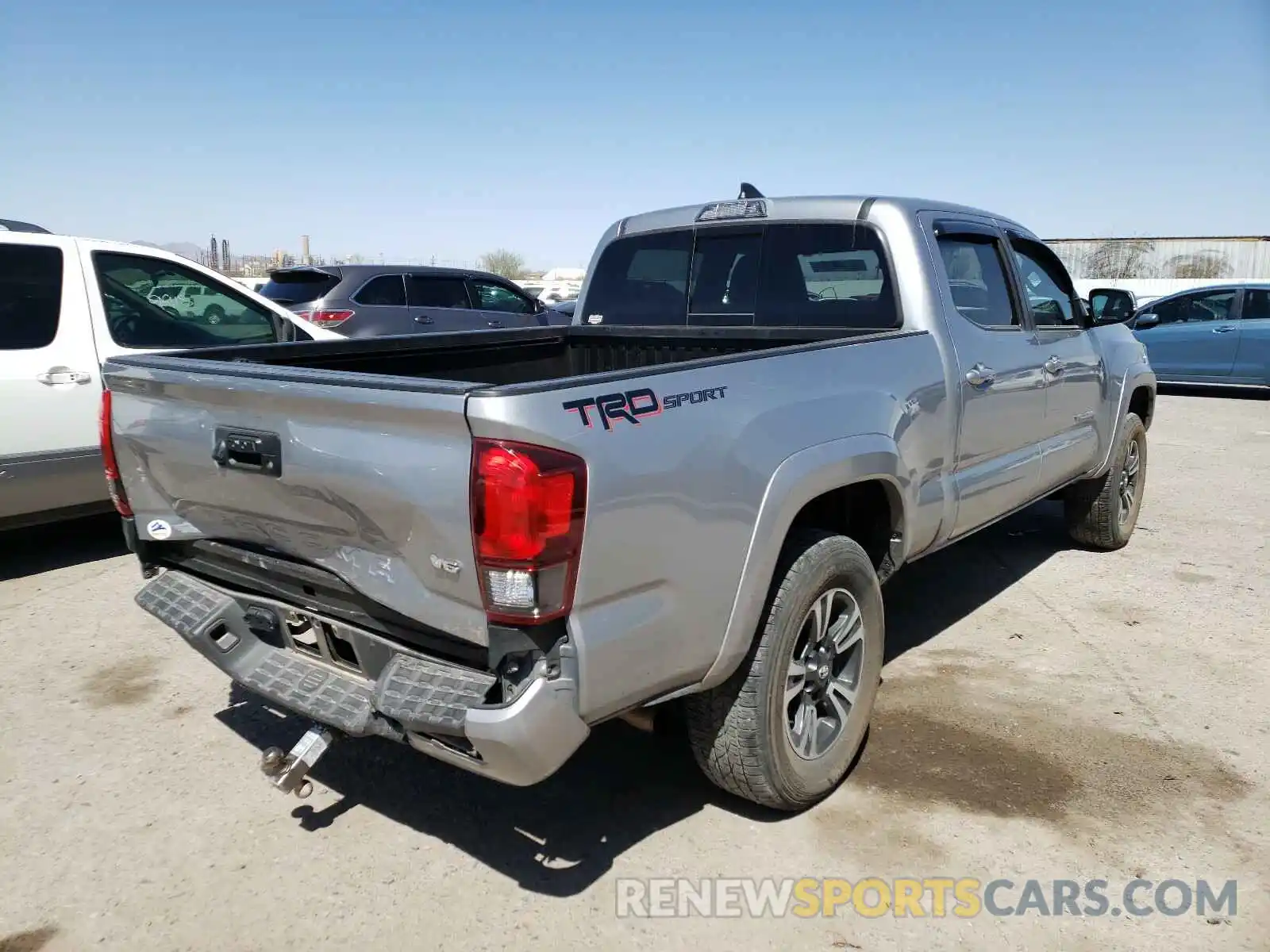 4 Photograph of a damaged car 3TMBZ5DN5KM022948 TOYOTA TACOMA 2019