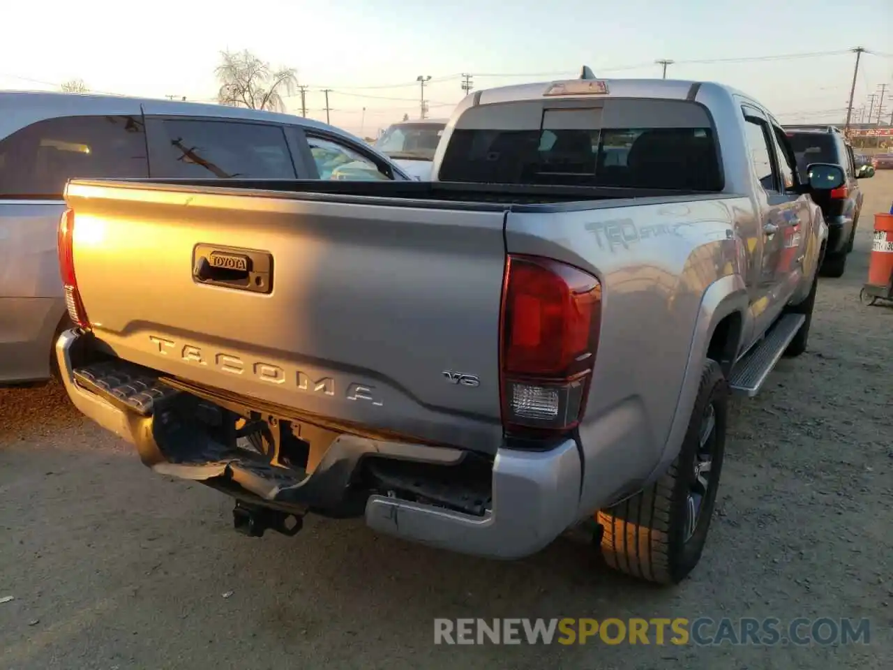 4 Photograph of a damaged car 3TMBZ5DN6KM017337 TOYOTA TACOMA 2019