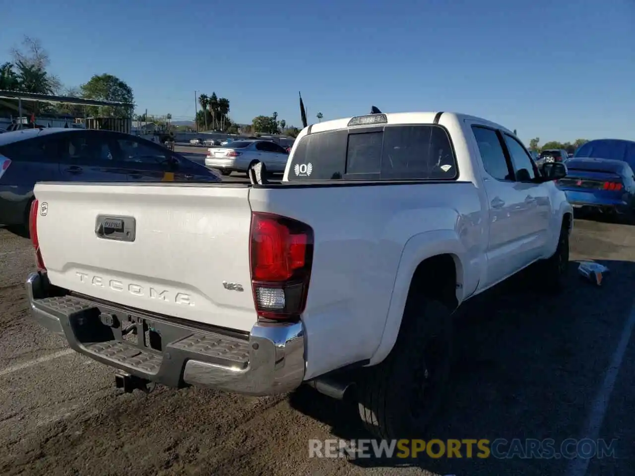 4 Photograph of a damaged car 3TMBZ5DN6KM022019 TOYOTA TACOMA 2019