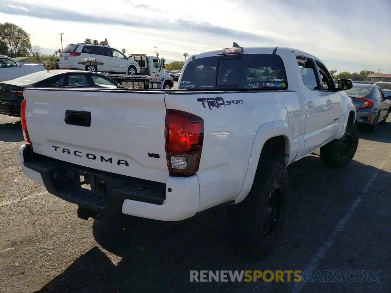 4 Photograph of a damaged car 3TMBZ5DN8KM017842 TOYOTA TACOMA 2019