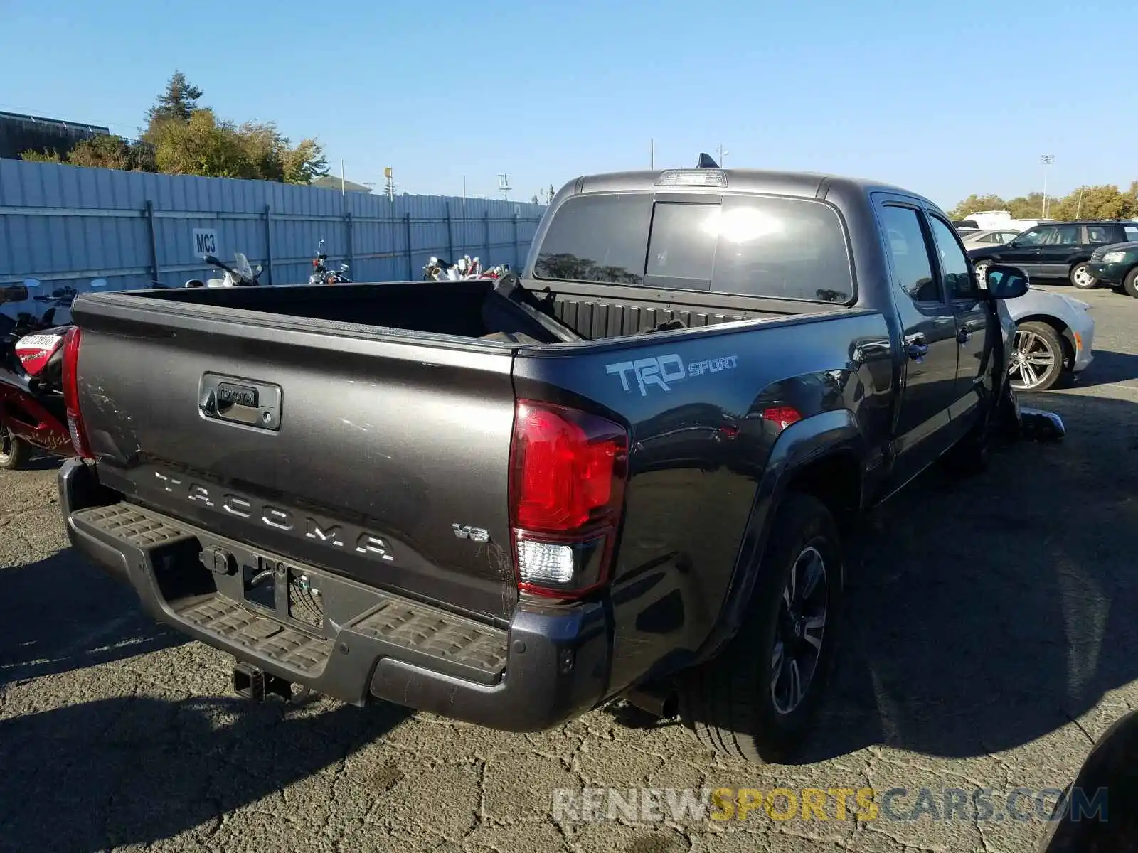 4 Photograph of a damaged car 3TMBZ5DN8KM020501 TOYOTA TACOMA 2019