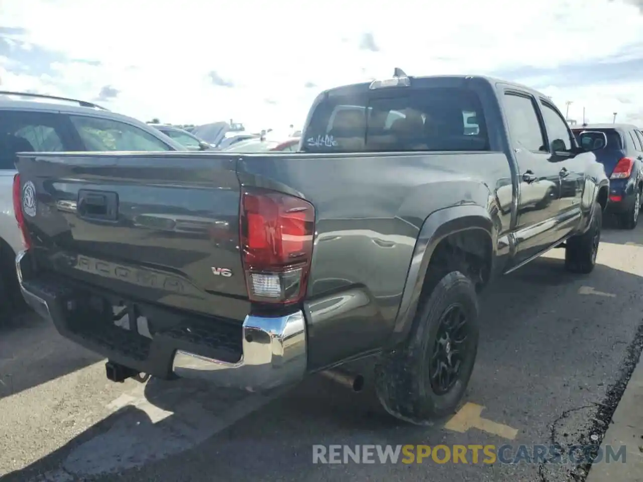 4 Photograph of a damaged car 3TMBZ5DN8KM023141 TOYOTA TACOMA 2019