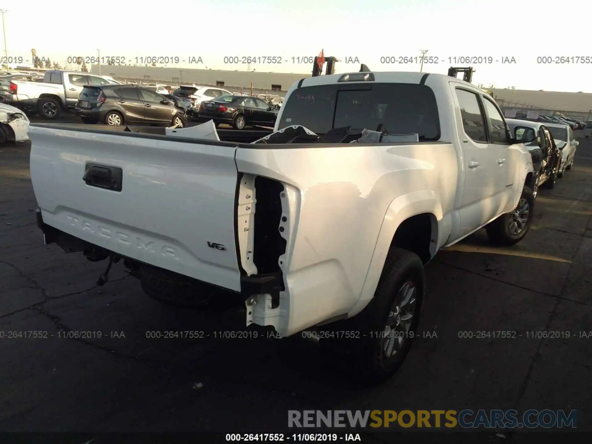 4 Photograph of a damaged car 3TMBZ5DN8KM023155 TOYOTA TACOMA 2019