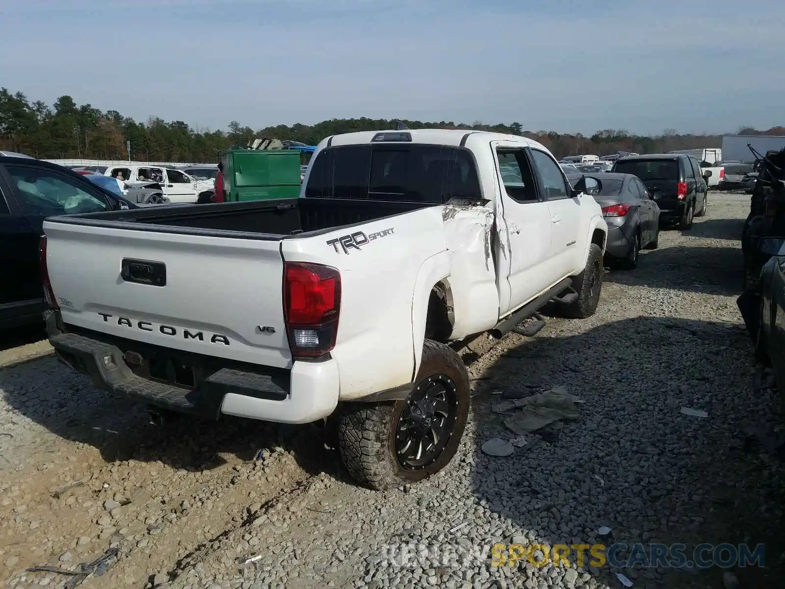 4 Photograph of a damaged car 3TMBZ5DN9KM017994 TOYOTA TACOMA 2019