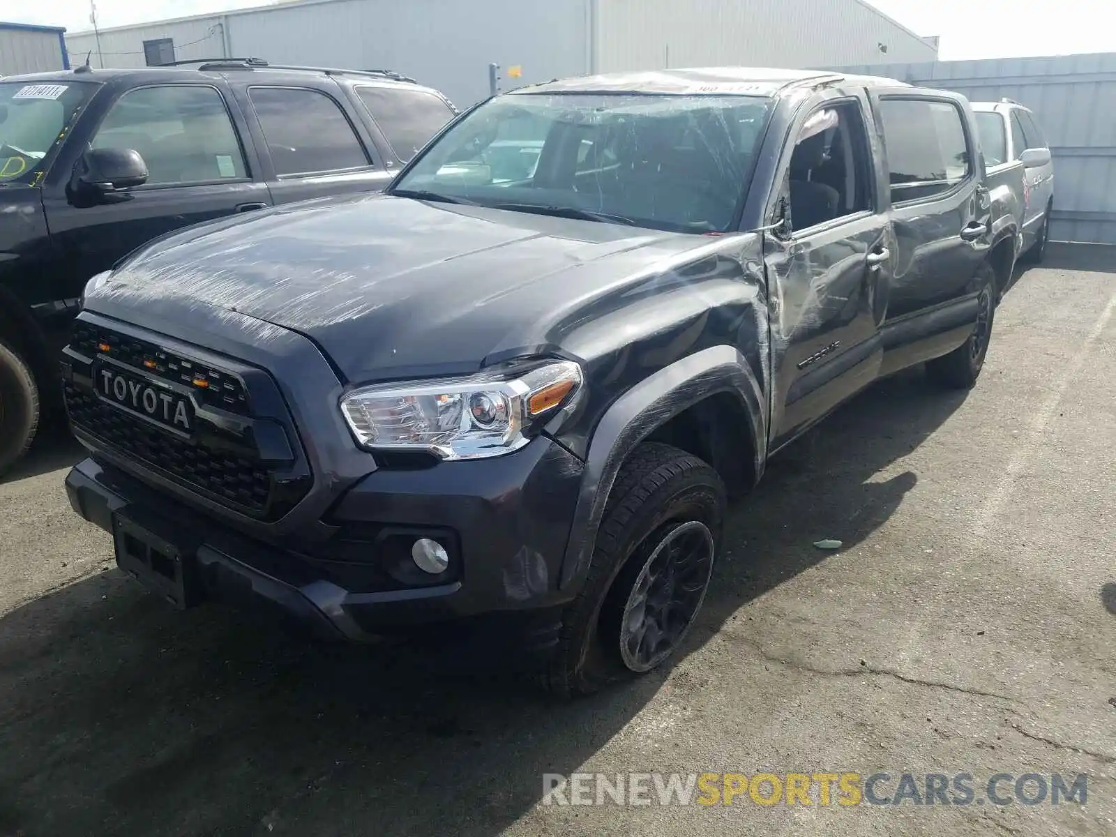 2 Photograph of a damaged car 3TMBZ5DNXKM018930 TOYOTA TACOMA 2019