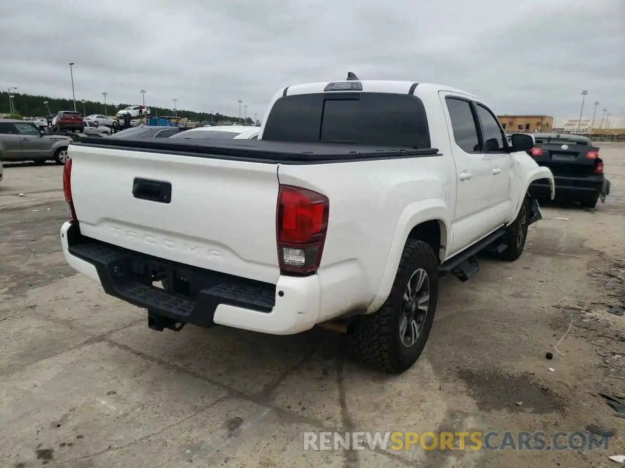 4 Photograph of a damaged car 3TMCZ5AN0KM191171 TOYOTA TACOMA 2019