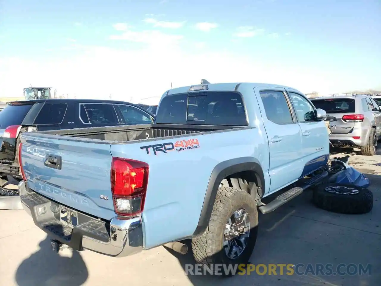 4 Photograph of a damaged car 3TMCZ5AN0KM195740 TOYOTA TACOMA 2019