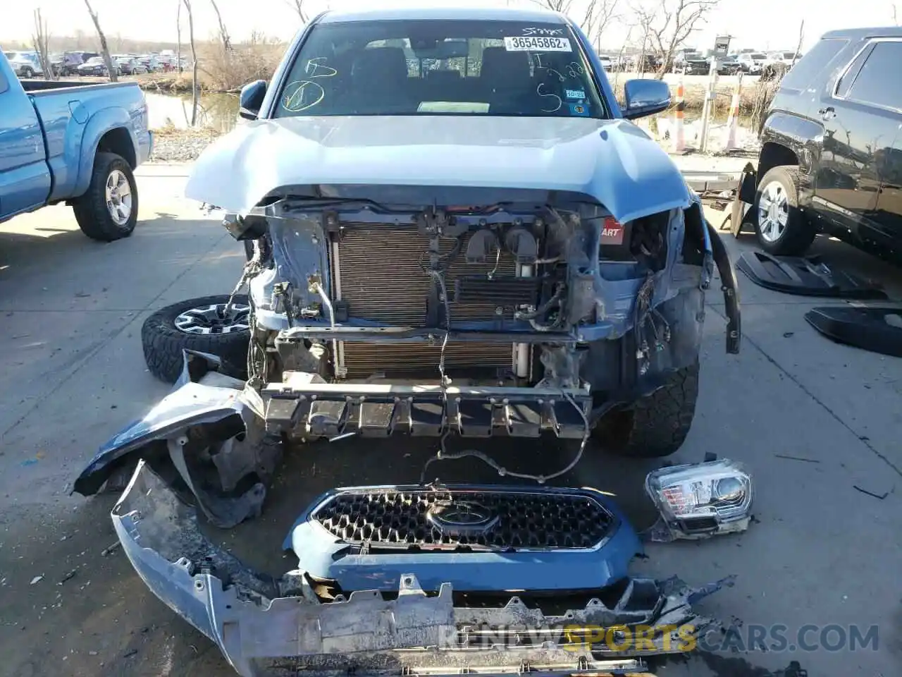 9 Photograph of a damaged car 3TMCZ5AN0KM195740 TOYOTA TACOMA 2019